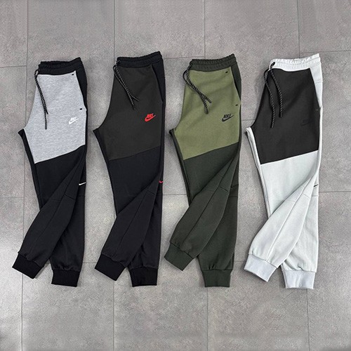 جاگر نایک تکفلیس (NIKE TECH FLEECE JOGGER 2025) رنگ مشکی سبز تیره لوگو قرمز سایز M